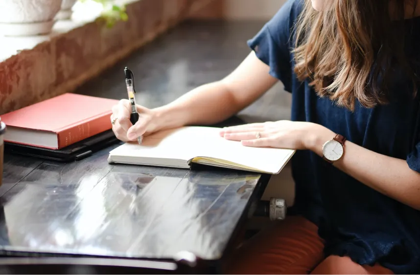 A woman line-editing a book in London